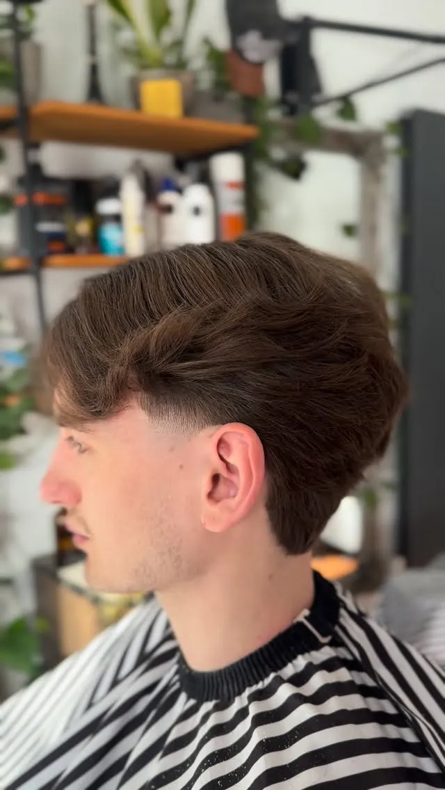 Skin fade into a textured top